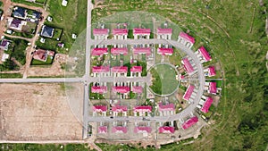 Aerial view of modern cottages, houses in a suburban settlement.