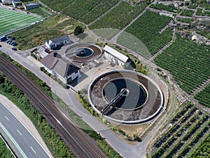 Aerial view of modern industrial sewage treatment plant beside the moselle river in germany