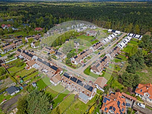 Aerial view of modern residential area with solar panels