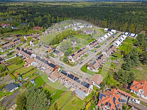 Aerial view of modern residential area with solar panels