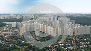 Aerial view of a modern residential area in Vnukovo and distant skyline of Moscow, Russia