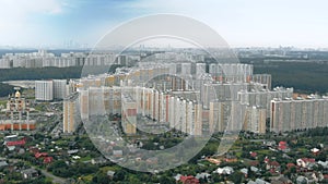 Aerial view of a modern residential area in Vnukovo and distant skyline of Moscow, Russia