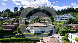 Aerial view of modern villa with large garden