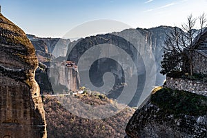 Aerial view of monastery Rousanou and breathtaking picturesque valley and landmark canyon of Meteora, Kalambaka, Greece