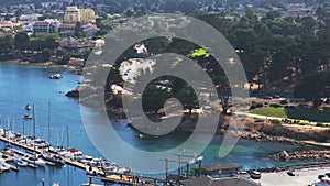 Aerial view of the Monterey Bay Aquarium, Pacific Grove with many yachts docked