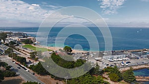 Aerial view of the Monterey Bay Aquarium, Pacific Grove with many yachts docked