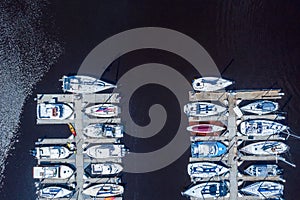 Aerial view of the Monterey town in California with many yachts docked by the pier