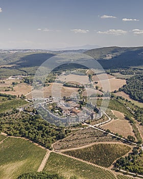 Aerial view of Monteriggioni, a beautiful small medieval village on the hill near the vineyard in Val d`Orcia, Tuscany, Italy