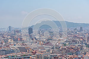 Aerial view of Montjuic hill behind the center of Barcelona, Spain