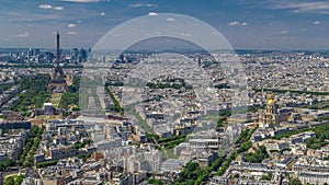 Aerial view from Montparnasse tower with Eiffel tower and La Defense district on background timelapse in Paris, France.