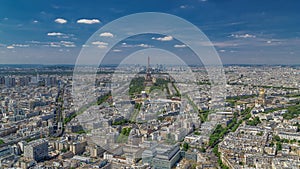 Aerial view from Montparnasse tower with Eiffel tower and La Defense district on background timelapse in Paris, France.