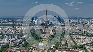 Aerial view from Montparnasse tower with Eiffel tower and La Defense district on background timelapse in Paris, France.