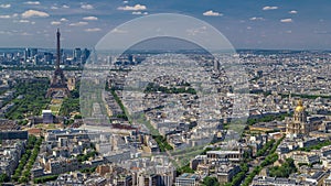 Aerial view from Montparnasse tower with Eiffel tower and La Defense district on background timelapse in Paris, France.