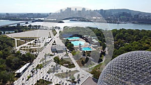 Aerial view of Montreal Biosphere and downtown city skyline in summer sunny day