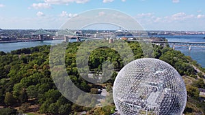 Aerial view of Montreal Biosphere and downtown city skyline in summer sunny day