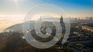 Aerial view of the Monument Motherland, shrouded in thick fog at dawn, Kiev, Ukraine. The concept of the apocalyptic