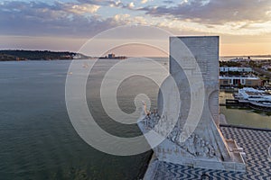 Aerial view of the Monument to the Discoveries Padrao dos Descobrimentos in the city of Lisbon, Portugal, at sunset;
