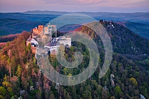 Aerial view on monumental Buchlov Castle, lit by setting sun. Czech republic.