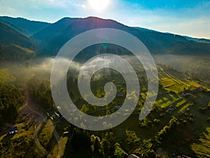 Aerial View of Morning Fog Over Mountains Willage