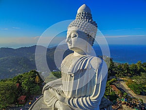 Aerial view in the morning at Phuket big Buddha in blue background