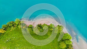 Aerial view of Most Na Soci lake in beautiful colors near Tolmin