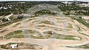 Aerial view of motorbike dirty racing track. Motocross motorcycle training track. Professional enduro motocross race track