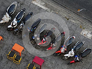 Aerial view of motorbikes parked in line