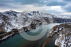 aerial view of mountain near the Irtysh river, the city landmark of Ust-Kamenogorsk, the road at the foot of the