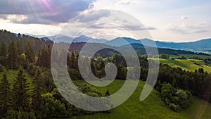 Aerial view of a mountain range with trees in the Tatra Mountains, Slovakia