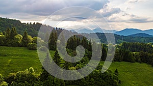 Aerial view of a mountain range with trees in the Tatra Mountains, Slovakia