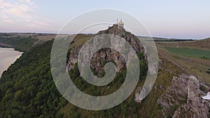 Aerial view. Mountain river flows through highest rocks. Landscape.