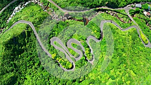 Aerial view mountain road at Jinguashi, Taiwan. Car driving through the curve.