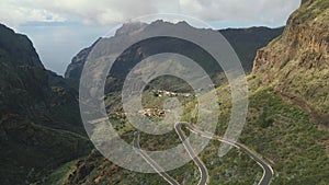 Aerial view of mountain road and town in Masca valley. Beautiful canyon in Tenerife, Canary Islands, Spain