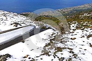 Aerial view from mountain top on coastal town photo