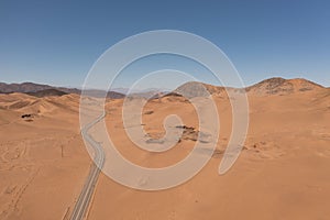 Aerial view of mountains and a road in the Atacama Desert near the city of Copiapo, Chile