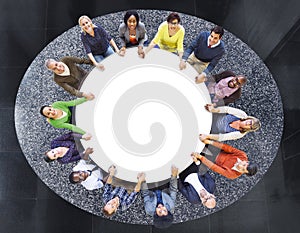 Aerial View of Multiethnic People Around the Table