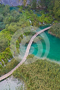 Aerial view of multiple waterfalls and boardwalk at croatia