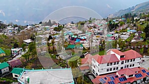 Aerial view of Mussoorie hilltop peak city located in Uttarakhand, India with colourful buildings.Himalayan Range