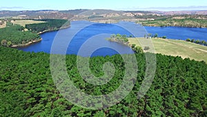 Aerial view of Myponga Dam Reservoir over Pine Forest