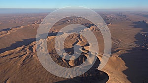 Aerial view of the Namib desert at sunrise in Namibia, Africa.