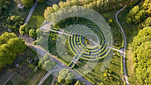 Aerial view a natural labyrinth in the botanical garden on a sunny day