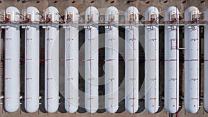 Aerial view natural white gas tank and pipeline, Tank storage chemical petroleum petrochemical refinery product at oil and gas sto