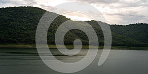 aerial view of nature background with green mountain and lake