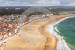 Aerial view of NazarÃ© beach and the Atlantic ocean, Portugal photo