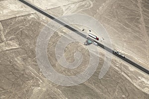 Aerial view Nazca desert and hieroglyphs near Pan American Highway, Nazca desert, Peru