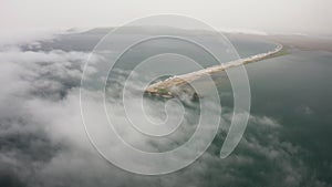 Aerial view of the Nazimov sand spit in fog, Russia