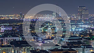 Aerial view of neighbourhood Deira with typical buildings night timelapse, Dubai, United Arab Emirates