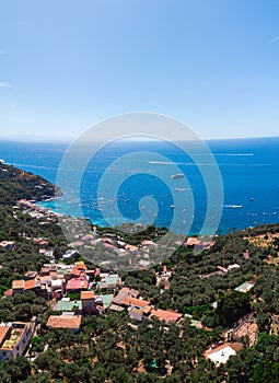 Aerial view Nerano village, Infrastructure of a small town in the south of Italy, old houses, tight construction, sea in the