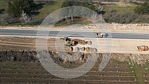 Aerial view on the new asphalt road under construction