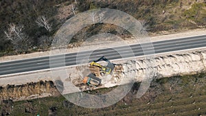 Aerial view on the new asphalt road under construction